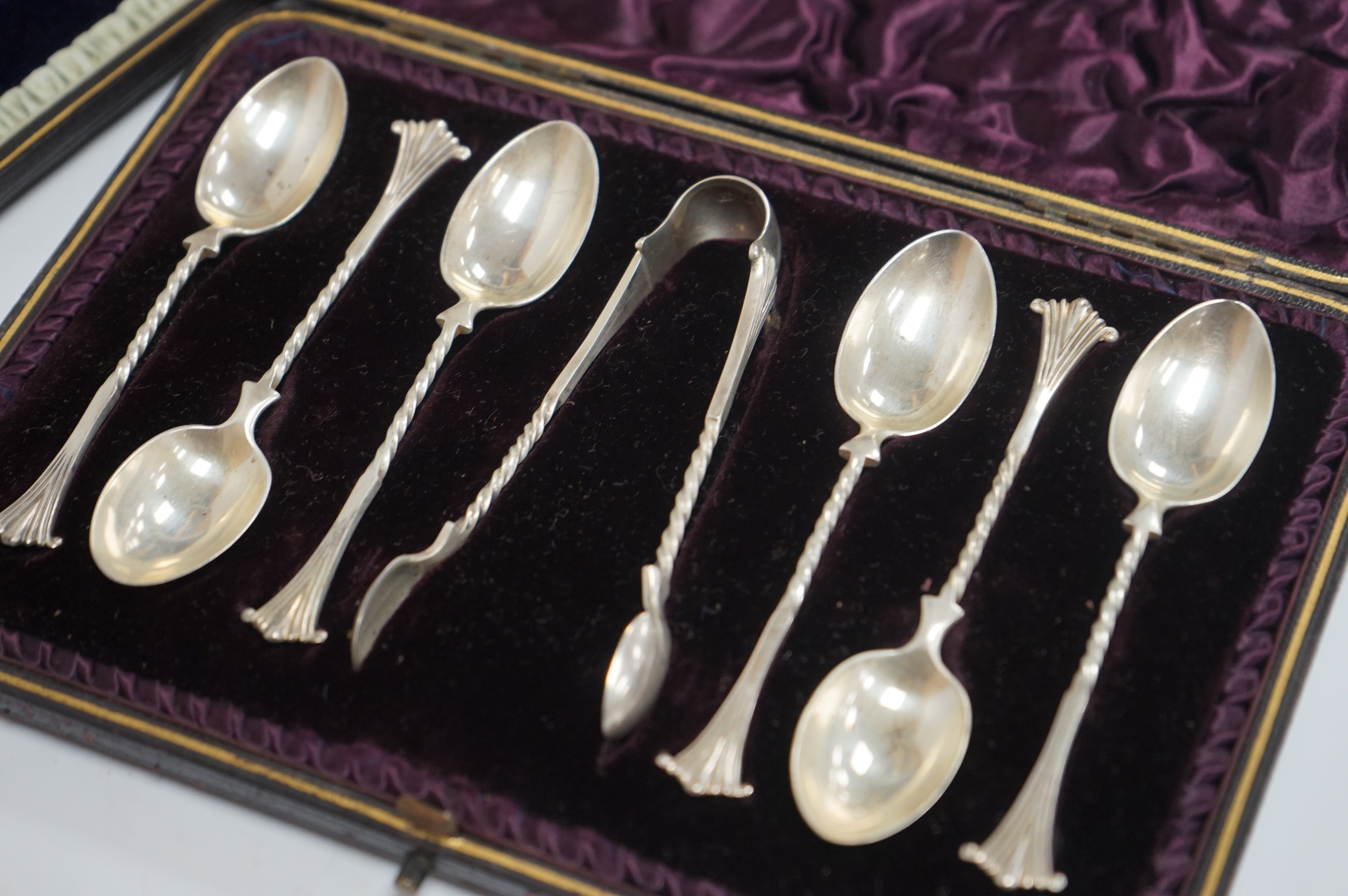 A cased pair of Victorian silver serving spoons and matching sifter spoon with engraved floral decoration, Atkin Brothers, Sheffield, 1888, together with a cased set of six late Victorian silver coffee spoons and matchin